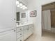 Bathroom featuring a white vanity and a neutral tile tub shower combination at 540 Vista Del Lago Ln, Wake Forest, NC 27587