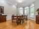 Formal dining room featuring hardwood flooring, crown molding, and lots of natural light at 540 Vista Del Lago Ln, Wake Forest, NC 27587