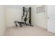 Small exercise room with basic weight lifting machine and white trim at 540 Vista Del Lago Ln, Wake Forest, NC 27587