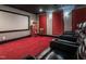 Home theater with projector screen and a retro popcorn machine at 540 Vista Del Lago Ln, Wake Forest, NC 27587
