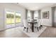 Dining room featuring modern decor and large sliding glass doors overlooking the outdoor space at 60 Lismore St, Sanford, NC 27330
