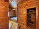 Bathroom with wood walls, large tub, and custom lighting at 603 Hugo St, Durham, NC 27704