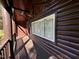Covered front porch with natural wood beams and a view of the yard at 603 Hugo St, Durham, NC 27704
