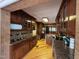 Spacious kitchen boasting wood cabinets, granite countertops, and modern stainless steel appliances at 603 Hugo St, Durham, NC 27704