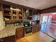 Traditional kitchen featuring wood cabinets, stainless steel appliances, and granite countertops at 603 Hugo St, Durham, NC 27704
