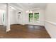 Bright, spacious dining room boasting hardwood floors, recessed lighting, and large windows at 66 Sweet Meadow Ln, Pittsboro, NC 27312