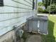 Exterior of home featuring AC unit and gas meter at 705 Washington St, Graham, NC 27253