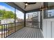 Screened outdoor balcony space with railings, providing a relaxing outdoor view at 710 W North St # 101, Raleigh, NC 27603