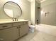 Updated bathroom features gray subway tiles, modern vanity and black fixtures at 80 Water Willow Ln, Zebulon, NC 27597