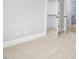 Bedroom featuring neutral carpet and open closet access at 80 Water Willow Ln, Zebulon, NC 27597