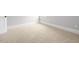 Bedroom featuring neutral carpet, white baseboards, and light grey walls at 80 Water Willow Ln, Zebulon, NC 27597