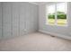 Bedroom with soft carpet, detailed wall trim and neutral tones, perfect for relaxation at 80 Water Willow Ln, Zebulon, NC 27597