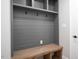 Mudroom features hooks, bench, and storage at 80 Water Willow Ln, Zebulon, NC 27597
