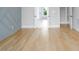 Hardwood floors in a room with doors and view to outdoors at 80 Water Willow Ln, Zebulon, NC 27597