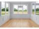 Bright room with large windows and hardwood floors at 80 Water Willow Ln, Zebulon, NC 27597