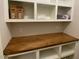 Abundant storage solutions with custom shelving and a durable wood countertop at 90 Water Willow Ln, Zebulon, NC 27597