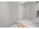 Powder room features a modern vanity with sleek fixtures and a large mirror at 9021 Albatross Ct, Raleigh, NC 27613