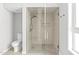 Modern bathroom featuring a glass-enclosed shower and sleek fixtures at 9021 Albatross Ct, Raleigh, NC 27613