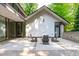 Modern patio area with outdoor seating and access to the home's interior at 9021 Albatross Ct, Raleigh, NC 27613