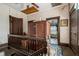 Second floor hallway with wooden floors and vintage wallpaper at 903 Nicholas St, Henderson, NC 27536