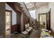 Elegant wooden staircase with vintage chandelier and intricate details at 903 Nicholas St, Henderson, NC 27536