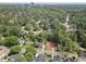 Aerial view of a vacant land lot among surrounding homes and mature trees at 913 Tyrrell Rd, Raleigh, NC 27609