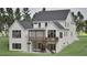 Exterior rear view of home showcasing a screened porch and staircase to yard at 913 Tyrrell Rd, Raleigh, NC 27609