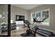 Home gym featuring modern exercise equipment and large windows providing plenty of natural light at 913 Tyrrell Rd, Raleigh, NC 27609