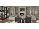Inviting living room with fireplace, built-in shelving, and an open layout perfect for entertaining guests at 913 Tyrrell Rd, Raleigh, NC 27609