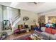 View of the living room area with a staircase and hardwood flooring at 10205 Sorrills Creek Ln, Raleigh, NC 27614