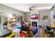 Living room with fireplace and large windows at 10205 Sorrills Creek Ln, Raleigh, NC 27614