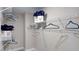 Walk-in closet with shelving and rods for optimal storage and organization at 1021 Dillon Lake Dr, Knightdale, NC 27545