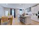 Bright kitchen with an island, modern cabinetry, and stainless steel appliances at 1021 Dillon Lake Dr, Knightdale, NC 27545