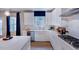 Bright kitchen with white cabinets, stainless steel appliances, and natural light at 1021 Dillon Lake Dr, Knightdale, NC 27545