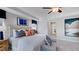 Well-lit bedroom with plush bed, neutral walls and a view to the ensuite bath at 1021 Dillon Lake Dr, Knightdale, NC 27545