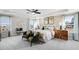 Bright main bedroom with decorative wallpaper, seating area, and ample natural light at 1021 Dillon Lake Dr, Knightdale, NC 27545