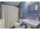 Cozy bathroom featuring a shower, toilet, and sink, designed for relaxation and convenience at 105 Fidelity St # B19, Carrboro, NC 27510