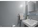 Bathroom featuring modern fixtures and finishes; includes a sink, mirror, and minimalist design at 105 Fidelity St # B19, Carrboro, NC 27510