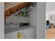 Practical laundry area with washer, dryer, shelving, and storage; offers convenience and organization at 105 Fidelity St # B19, Carrboro, NC 27510