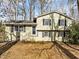 Charming two-story home with black shutters and well-maintained front yard landscaping at 1195 Champion Dr, Cary, NC 27511