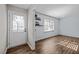 Bright, inviting room with hardwood flooring, ample natural light and a welcoming entrance creates a warm atmosphere at 1195 Champion Dr, Cary, NC 27511