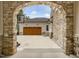 Long driveway leading to a two-car garage, complemented by a basketball hoop at 121 Anfield Rd, New Hill, NC 27562