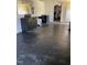 View of interior with a sink, cabinets, reflective exit sign, and exit door on the left at 1403 S Roxboro Street, Durham, NC 27703