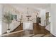 Gourmet kitchen with white cabinetry, stainless steel appliances, and a large center island perfect for entertaining at 1475 Sierra Glen Cir, Apex, NC 27502