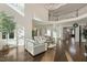 Expansive living area boasts of hardwood floors, large windows, and natural light with an inviting atmosphere at 1475 Sierra Glen Cir, Apex, NC 27502