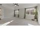 Spacious main bedroom features soft natural light and doorway views to other rooms in the home at 1475 Sierra Glen Cir, Apex, NC 27502