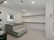 Spacious walk-in closet with custom storage solutions including drawers, shelves, and hanging rods at 1475 Sierra Glen Cir, Apex, NC 27502