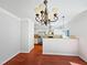 Open-concept living room offers kitchen views, creating a seamless entertainment space at 148 Daneborg Rd, Durham, NC 27703