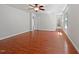 Spacious main bedroom features a ceiling fan, hardwood floors, and natural light from the window at 148 Daneborg Rd, Durham, NC 27703