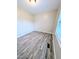 Bedroom featuring wood-look floors, neutral paint and a bright window at 1602 Fairground Rd, Dunn, NC 28334